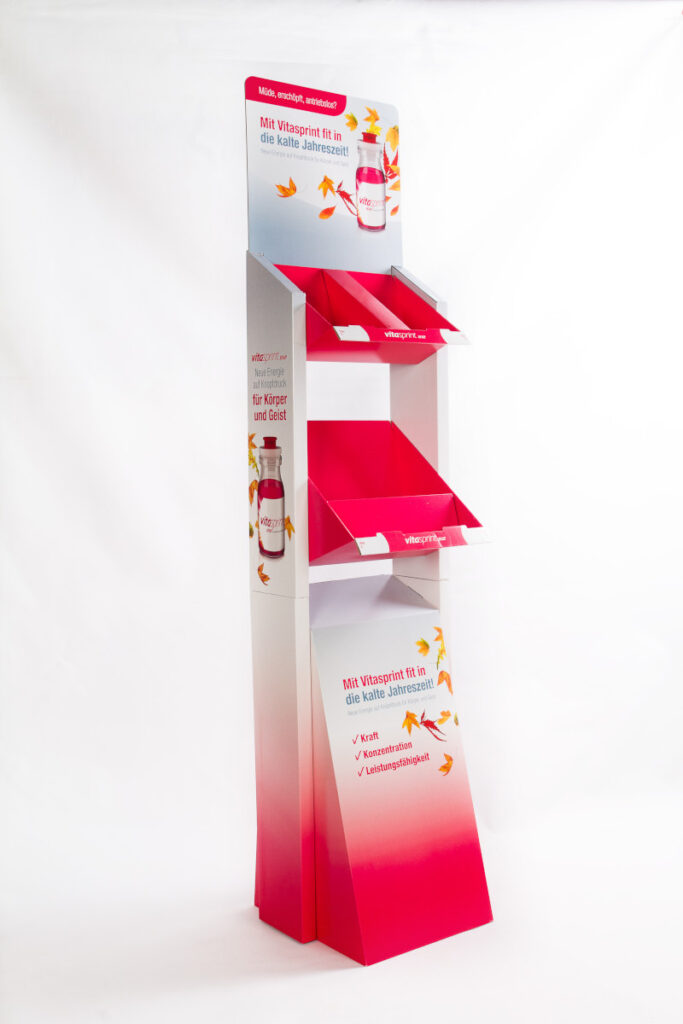 Beispiel eines Bodenaufstellers in rot und weiß mit zwei Schütten zur Platzierung des Produkts.