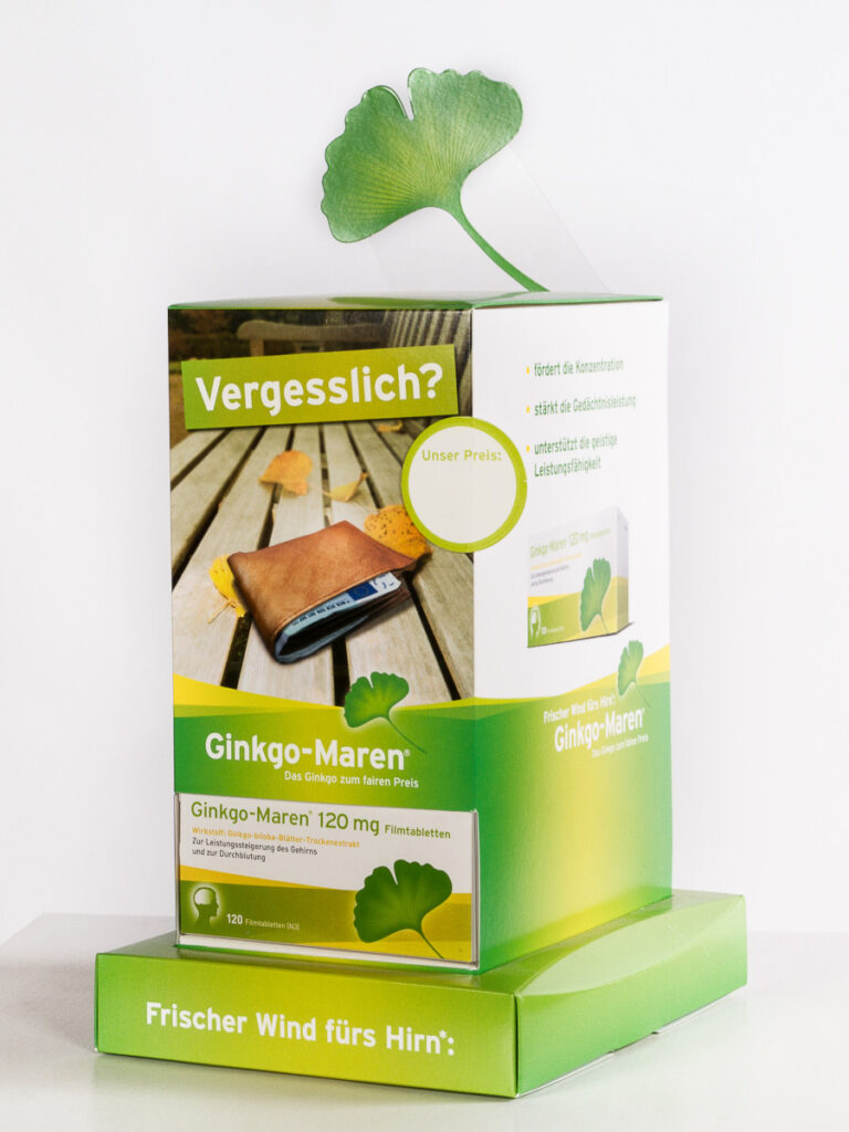 Beispiel für ein Thekendisplay, bestehend aus einem Quader mit Aufdrucken auf allen Seiten.